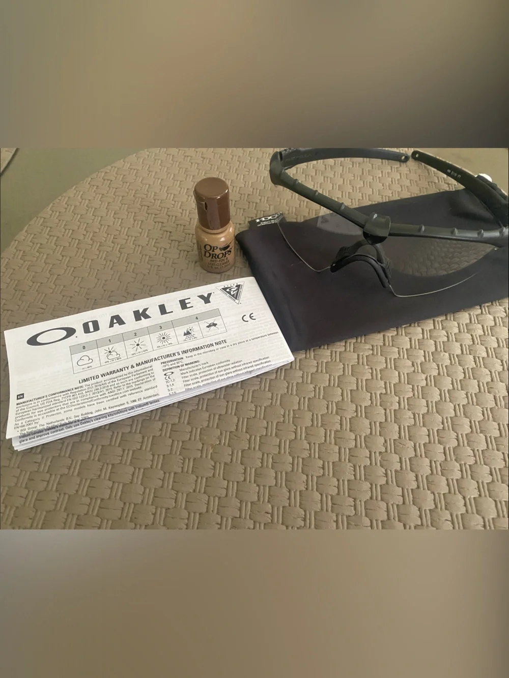 Oakley Men’s Black Impact Resistant Frame Sunglasses with Clear Nosepiece
